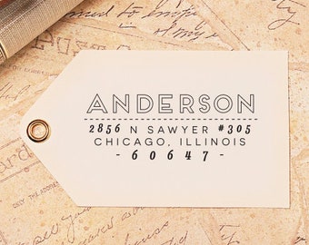 Puede incluir: Una etiqueta de dirección de devolución blanca con texto negro. El texto dice "ANDERSON", "2856 N SAWYER #305", "CHICAGO, ILLINOIS" y "-60647-".