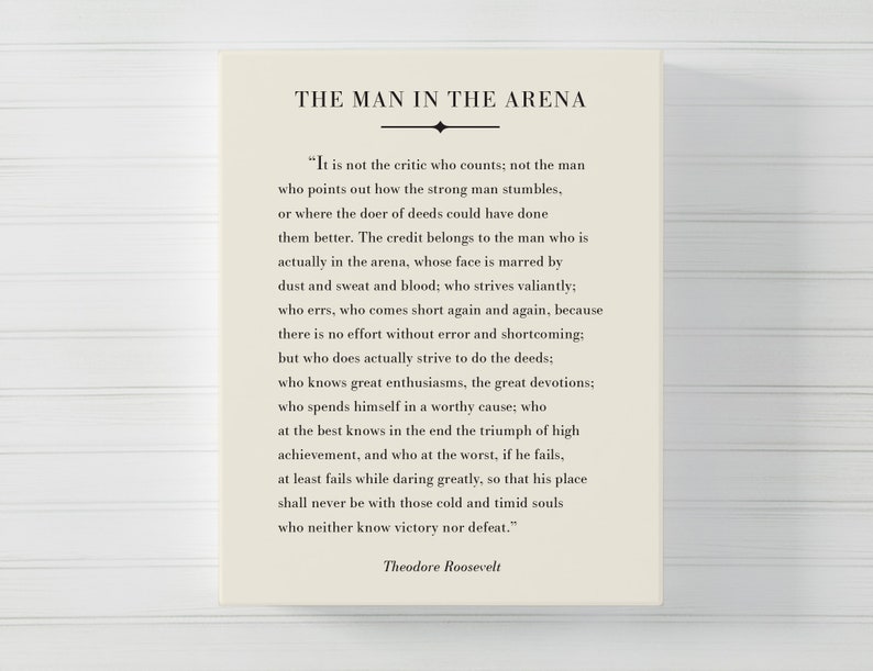 May include: A black and white printable quote by Theodore Roosevelt about the importance of action and perseverance. The quote is titled "The Man in the Arena".