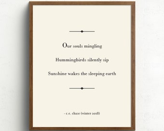 May include: A framed print with a poem that reads "Our souls mingling Hummingbirds silently sip Sunshine wakes the sleeping earth - c.c. chase (winter 2018)"