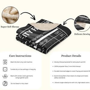 May include: Black and white blanket with text, "EITY F thinking introve feelings 108% 99% 070". The blanket has a soft, plush sherpa backing and is made of 100% polyester. Features include durable hemmed edges and a vibrant single-sided print.