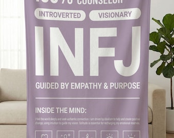 May include: A lavender blanket with white text. The blanket reads "100% THE ADVOCATE / COUNSELOR" and "INFJ GUIDED BY EMPATHY & PURPOSE." Below, it says "INSIDE THE MIND" with icons and descriptions. The blanket is held up by a person.