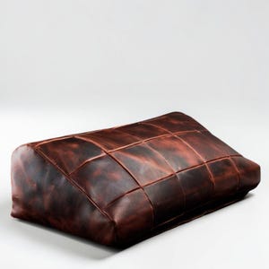 May include: A handmade wooden sign with the text "Welcome" in a playful font. The sign is painted white with a distressed finish, and features a decorative floral design in shades of pink and green. It measures approximately 12 inches wide.