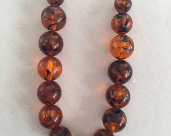 AmberVintage Plastic Beads on Gold Chain 23"