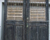 antique mediterranean wood doors with iron panels,salvage european doors,gray black doors,architectural,carved wood door,tall heavy doors
