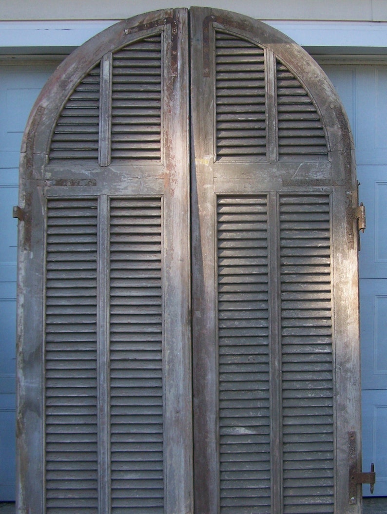 Arched wood shutter antique doors