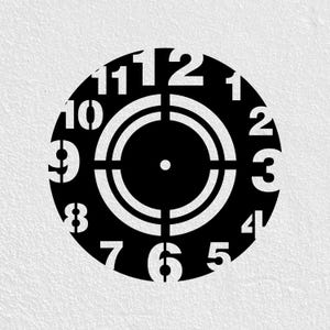 May include: A black and white clock face design. The clock face is circular with white numerals marking the hours. The center features a target-like design. The clock face is set against a textured white background.