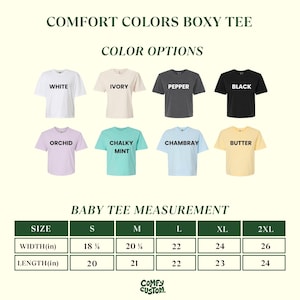 May include: A product image showcasing a Comfort Colors boxy tee in various colors: white, ivory, pepper, black, orchid, chalky mint, chambray, and butter. Measurements are provided in inches for sizes S to 2XL.