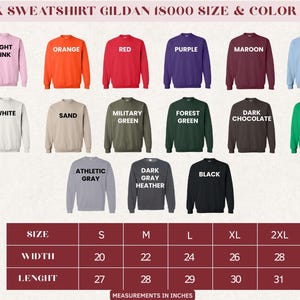 May include: A color chart for Gildan 18000 unisex sweatshirts, showcasing various colors like light pink, orange, red, purple, maroon, and light blue. The chart also includes a size guide with measurements in inches, ranging from S to 2XL, with widths from 20 to 28 inches and lengths from 27 to 31 inches.