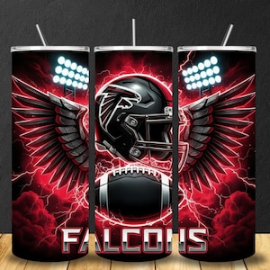 May include: A set of three stainless steel tumblers with a football theme. Each tumbler features a black football helmet with wings, a football, and the word "FALCONS" in silver. The background is red with lightning.