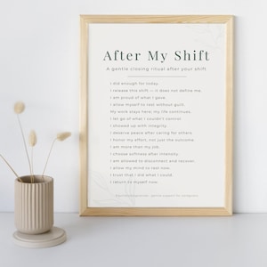May include: A framed print with the text "After My Shift" in a light-colored wooden frame. The print features a list of affirmations in a minimalist design. A beige ceramic vase with dried flowers sits to the left of the frame.