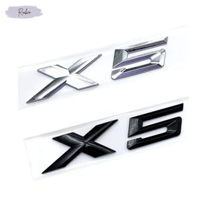 X5-embleembadge: chromen en zwarte sticker op kofferbaklogo (E53, E70, F15)