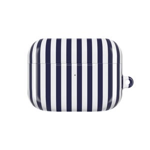 May include: A white and navy blue striped case for wireless earbuds. The case is rectangular with rounded edges and a small loop on the side. The design features vertical stripes.