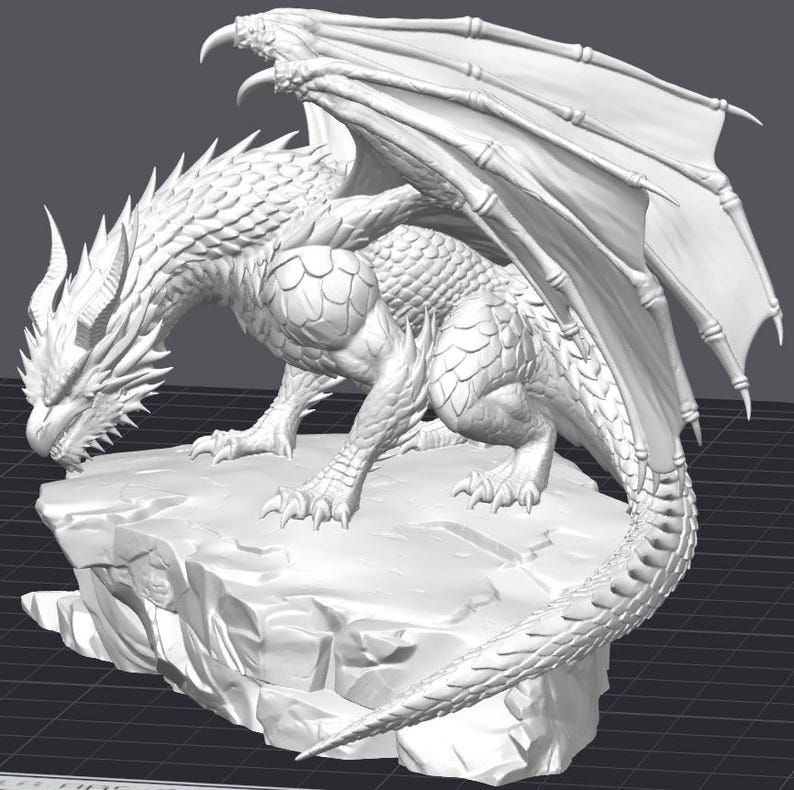 May include: A detailed, white dragon sculpture with large wings, perched atop a rocky base. The dragon has intricate scale and wing detailing, with a long tail and sharp claws. The sculpture is a fantasy-themed item.
