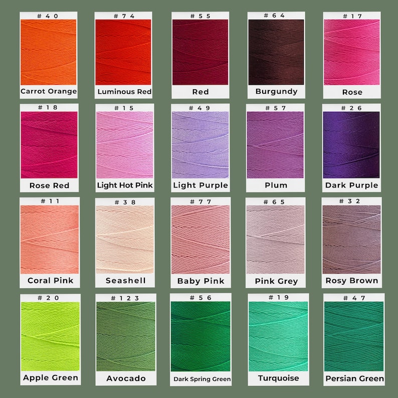 May include: A color chart featuring various shades of thread. The chart displays a range of colors, including orange, red, pink, purple, green, and brown. Each color is labeled with a name and a number.