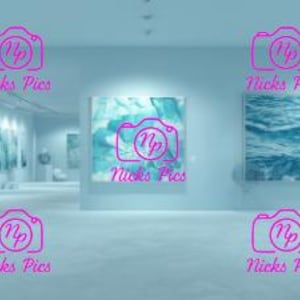May include: An art gallery featuring several framed abstract paintings with shades of blue and white. The gallery has a minimalist design with white walls and a light-colored floor. The paintings depict water and cloud formations.