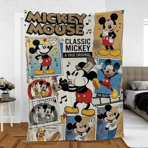 May include: A cream-colored fleece blanket featuring a collage of Mickey Mouse illustrations. The text reads Mickey Mouse, Classic Mickey, A True Original, Oh Boy, and Hot Dog. The design includes various poses of Mickey and Pluto in frames.