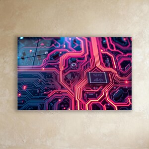 Può includere: Primo piano di un circuito stampato con una complessa rete di linee rosse e blu. La scheda presenta un processore centrale e vari componenti elettronici. L'immagine è una vibrante esposizione di tecnologia e design.