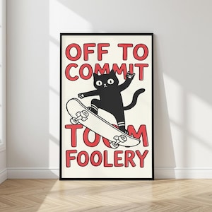 May include: A framed print with a black cat on a skateboard. The cat is set against a cream background, with the words "OFF TO COMMIT TOM FOOLERY" in red. The print is in a black frame, suitable for a home.