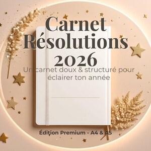 May include: A white notebook with the text "Carnet Résolutions 2026" and the phrase "Un carnet doux & structuré pour éclairer ton année". The notebook is surrounded by gold stars and decorative elements. The text "Édition Premium - A4 & A5" is also visible.
