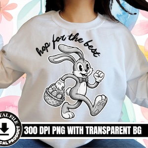 May include: A white ceramic mug with a black handle and the text "But First, Coffee" in a bold, black font. The mug is on a wooden surface. The mug is approximately 10 cm tall.