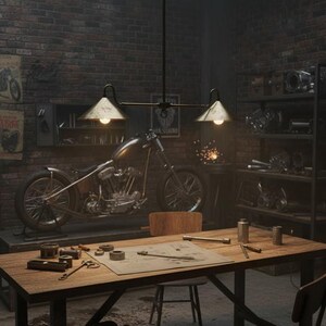 May include: A vintage motorcycle shop interior with a custom motorcycle on a lift. A wooden table displays tools and blueprints under a dual-lamp fixture. The brick wall features vintage posters and a metal shelf with parts.