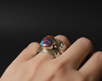 Anello ovale con acquamarina: semplice fascia in argento Sterling 925 con più pietre.