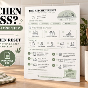 May include: A white printable kitchen cleaning checklist titled The Kitchen Reset with black text and sage green accents. It features sections for choosing time, selecting cleaning tasks, a reset kit list, and a numbered six-step cleaning process.