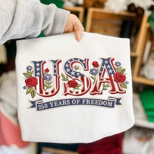 Projekt haftu z napisem na fladze USA z okazji 250 lat wolności, do natychmiastowego pobrania
