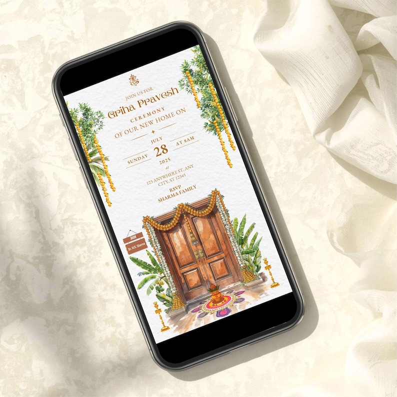 May include: A smartphone displays an invitation for a housewarming ceremony. The invitation features a watercolor illustration of a wooden door adorned with garlands and greenery. Text includes the event details: date, time, and RSVP information.