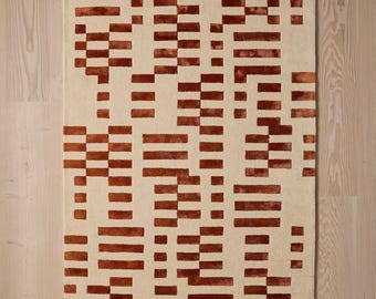 Raya Rug Rust Anthropologie Modern Handmade Rugs and Carpets for living room and bedroom