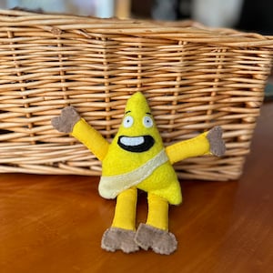 Sci-fi Character Plushie Badgey. Flip him over Happy then Angry .