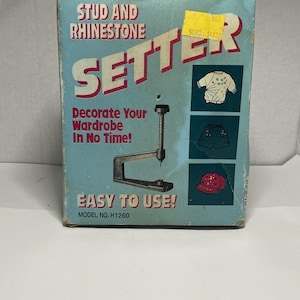 May include: A light blue box for a stud and rhinestone setter tool. The box has the words "STUD AND RHINESTONE SETTER" in red and white. The box also says "Decorate Your Wardrobe In No Time! EASY TO USE!" and shows images of clothing.