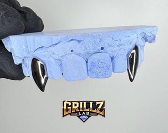 ¡Parrillas de colmillo de vampiro! ¡Envío gratis!