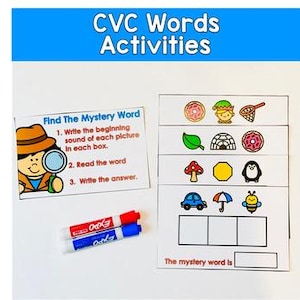 May include: Educational activity set for CVC words. Includes a card with instructions and a detective illustration, along with picture cards and a fill-in-the-blank section. Two dry-erase markers are also present.