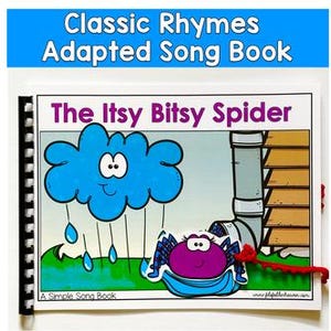 May include: A children's songbook titled "The Itsy Bitsy Spider" with the text "Classic Rhymes Adapted Song Book" at the top. The cover features a cartoon spider and a blue cloud with raindrops. The book is bound with a black spiral.