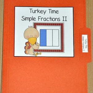 May include: An orange file folder with a white label that reads "Turkey Time Simple Fractions II." The folder has a printed image of a cartoon turkey and a fraction diagram with blue and white sections.