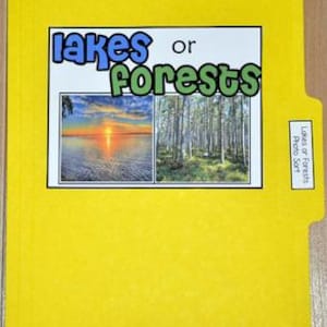 May include: A yellow file folder with the words "lakes or forests" in blue and green text. The folder has a white rectangle with two images: a sunset over a lake and a forest. A smaller label on the side reads "Lakes or Forests Photo Sort."