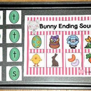 May include: A metal baking tray displays a learning activity. The activity features a card with the text "Bunny Ending Sounds" and illustrations of a bunny, eggs, and other Easter-themed images. Green letter tiles are arranged on the tray.