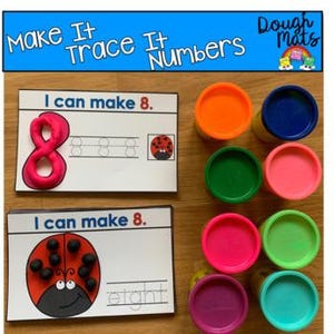 May include: Educational play dough set with the text "Make It Trace It Numbers". Includes cards with the number 8 and a ladybug, plus colorful play dough containers. The cards read "I can make 8" and "eight".