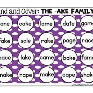 Può includere: Un foglio di lavoro educativo viola e bianco intitolato "Find and Cover: THE -AKE FAMILY". Il foglio di lavoro presenta una griglia di cerchi bianchi, ognuno contenente una parola della famiglia di parole -ake, come "cake", "lake" e "shake".