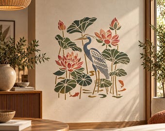May include: A wall decal featuring a blue heron standing among pink lotus flowers, green lily pads, and small orange fish. The design is rendered in a flat, graphic style with muted tones, applied directly to a light beige interior wall surface.