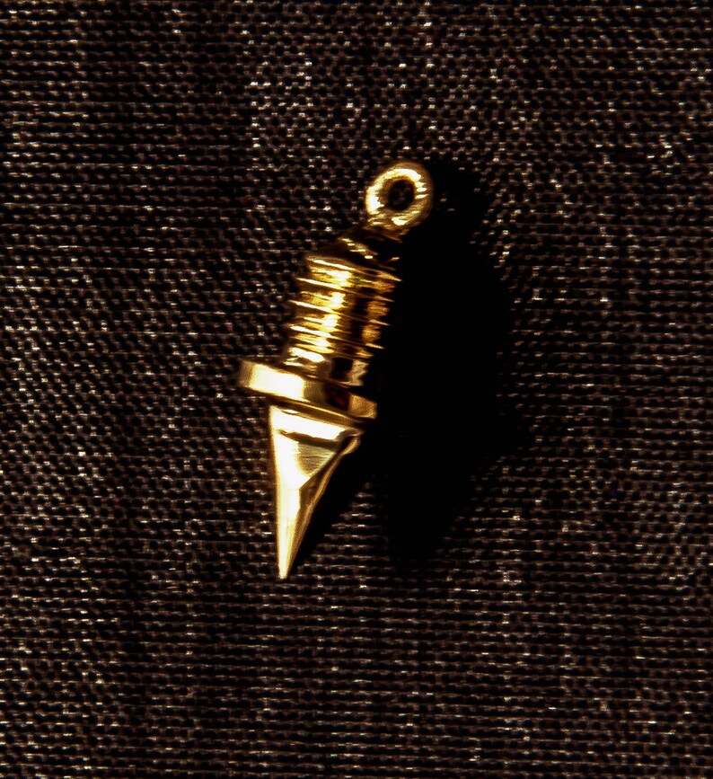 gold track and field spikes