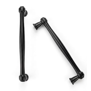 May include: Two black cabinet pulls with a matte finish. The pulls have a classic design with rounded ends and a slightly curved handle. The hardware is shown against a white background.