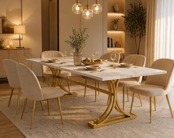 Tavolo da pranzo moderno bianco con gambe dorate, ideale per arredare la casa in stile contemporaneo e per momenti di convivialità.