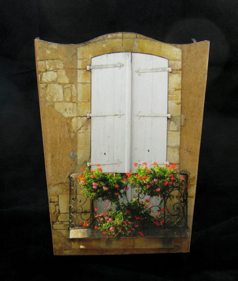 Wastebasket Shutters and Flowers in Domme France image 1