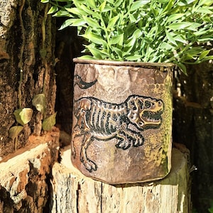 Hand-Tooled Copper Jar with T-Rex Skeleton Motif – For Fossil Lovers, Dark Academia Aesthetes & Prehistoric Art Collectors