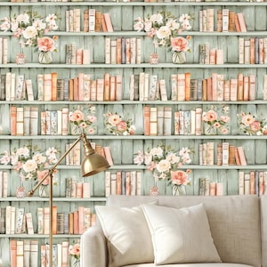 May include: A wallpaper design featuring a faux bookshelf with rows of books in various colors. The shelves are a light teal color, and the books are accented with floral arrangements in glass jars. A sofa, lamp, and table are in the foreground.