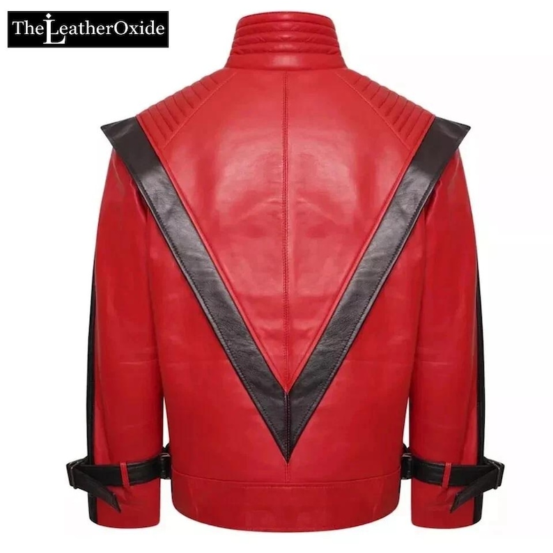 May include: A red leather jacket with black detailing. The jacket has a high collar, quilted shoulder panels, and a black V-shaped design on the back. The sleeves have black stripes and buckle fastenings. The LeatherOxide logo is in the top left corner.