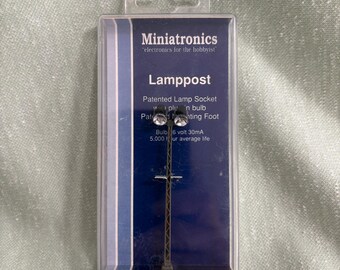 Minatronics model #72-628-01. Rail yard spit light double searchlight