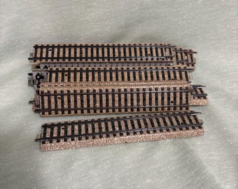 Marklin 5106 straight track. 15 pieces.